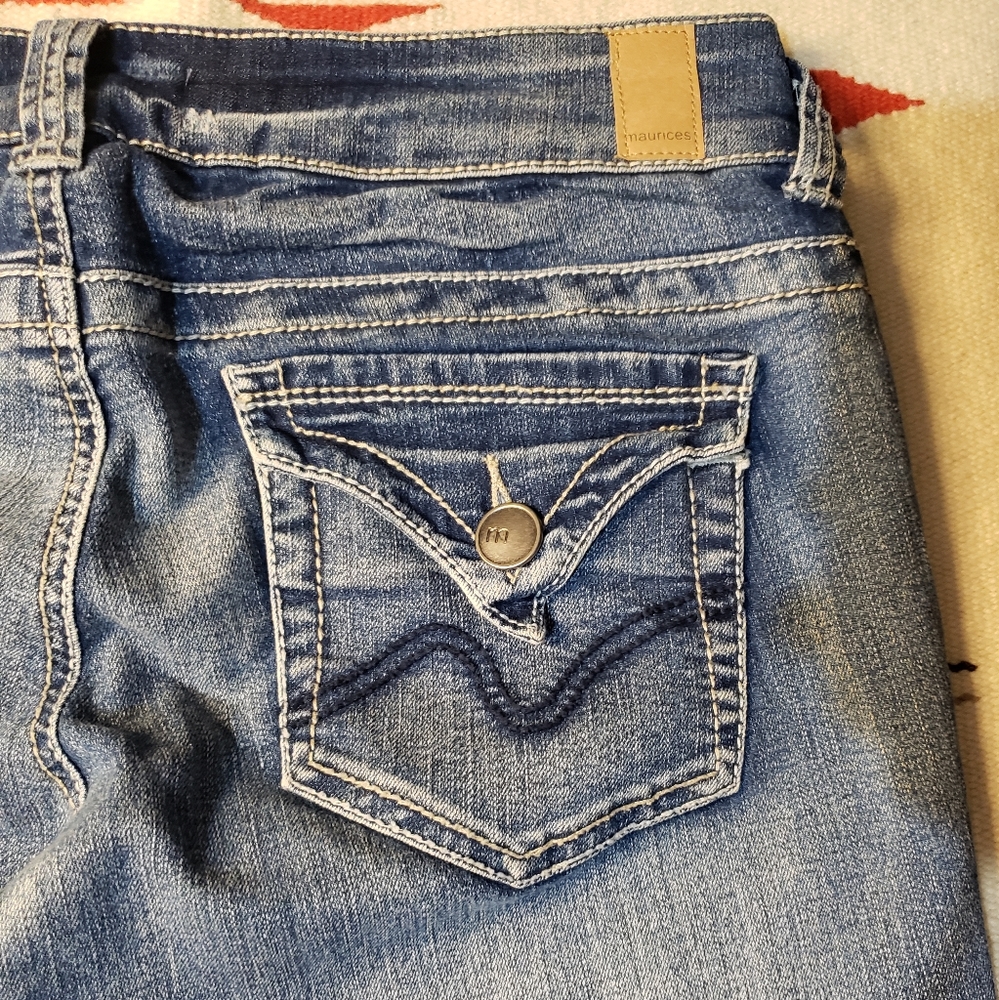 Maurices size large lightly distressed jeans with flap back pockets